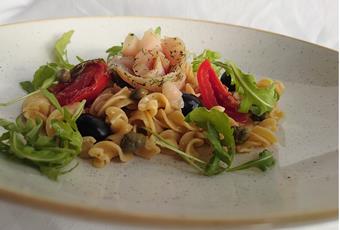 Schüttelbrot fusilli with lightly smoked char, rocket, olives, sun-dried tomatoes and capers