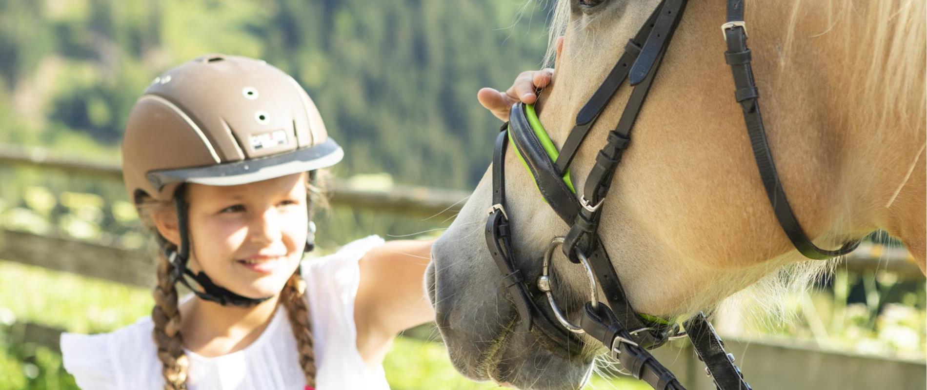 Horse-riding-child-haflinger-horse-Avelengo-Verano-Merano2000-ml