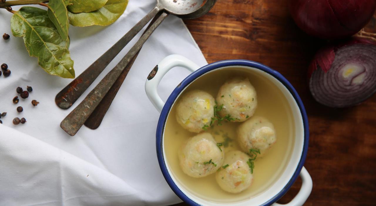 Bread dumpling in vegetable fond