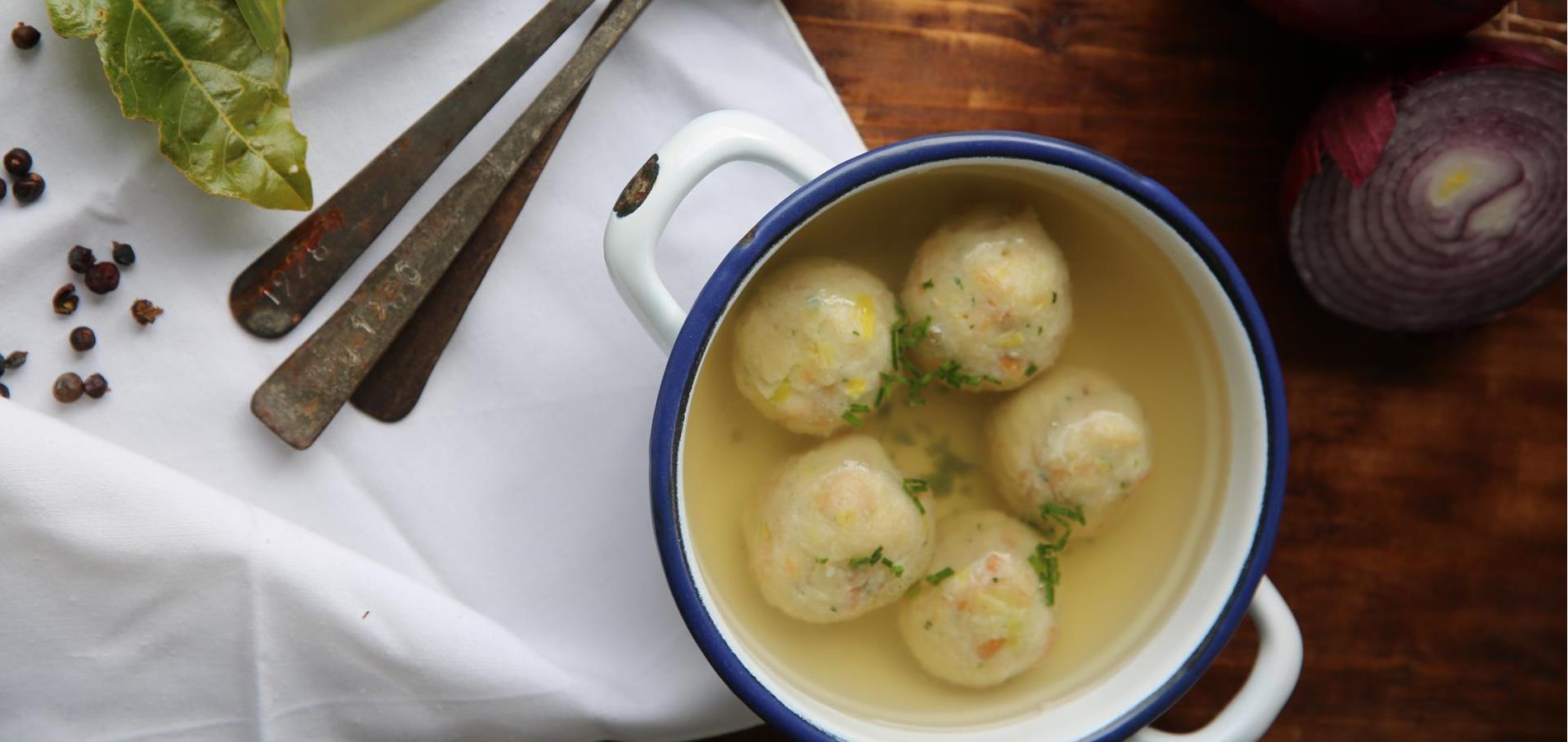 Bread dumpling in vegetable fond