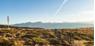 Three people ride their mountain bikes along the path at the Vigiljoch / Monte San Vigilio.