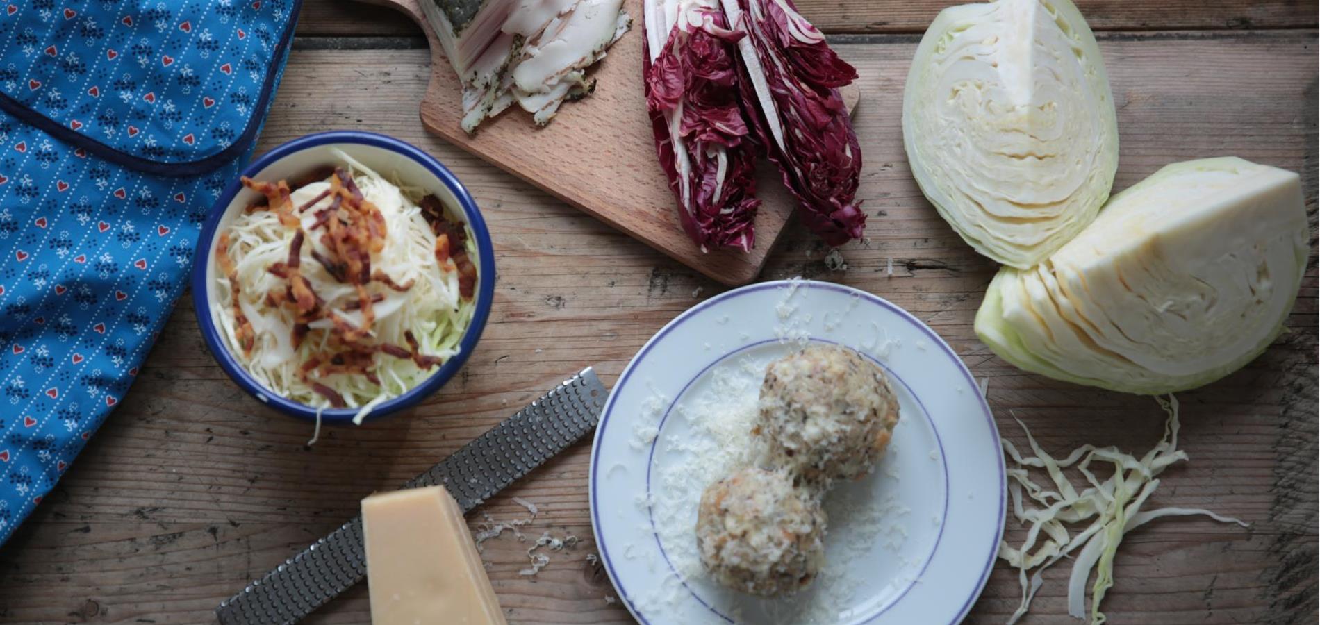 Buckwheat dumplings with bacon-coleslaw-salad