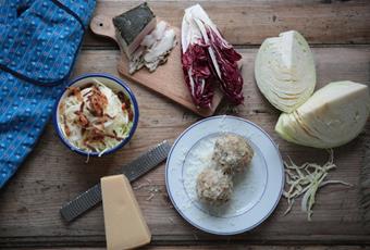 Buckwheat dumplings with bacon-coleslaw-salad