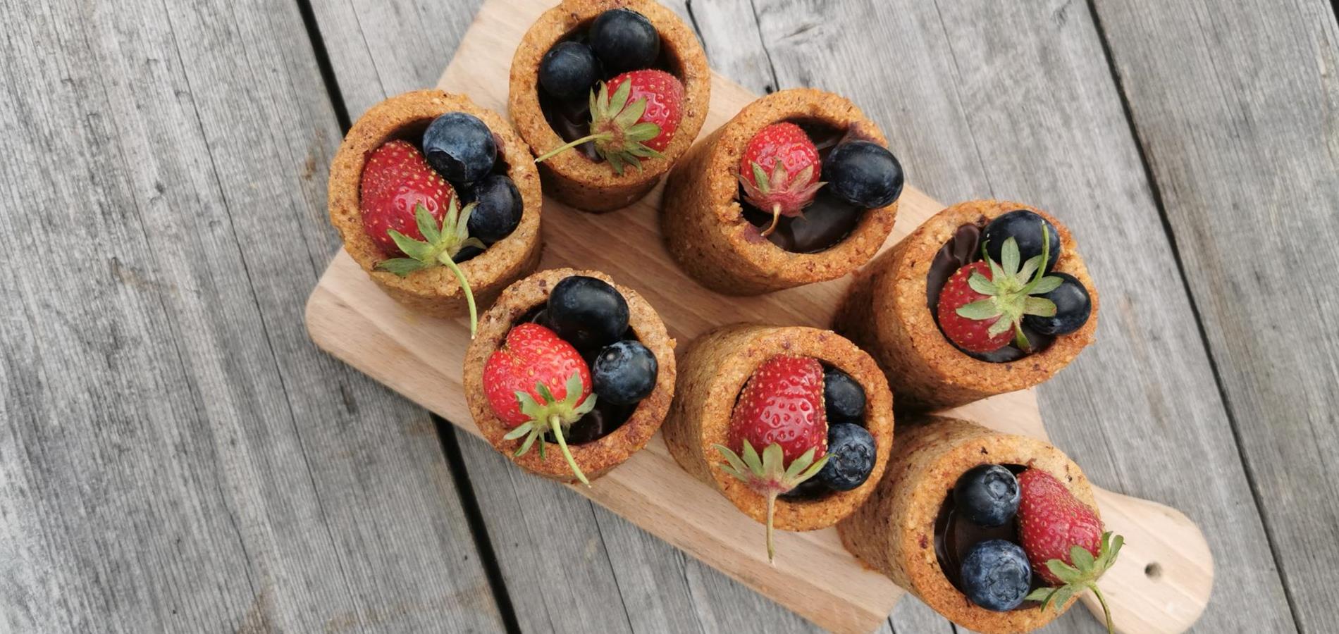 Hazelnut shots with chocolate cream and berries