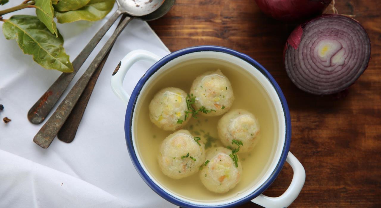 Bread dumpling in vegetable fond