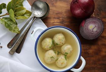 Bread dumpling in vegetable fond