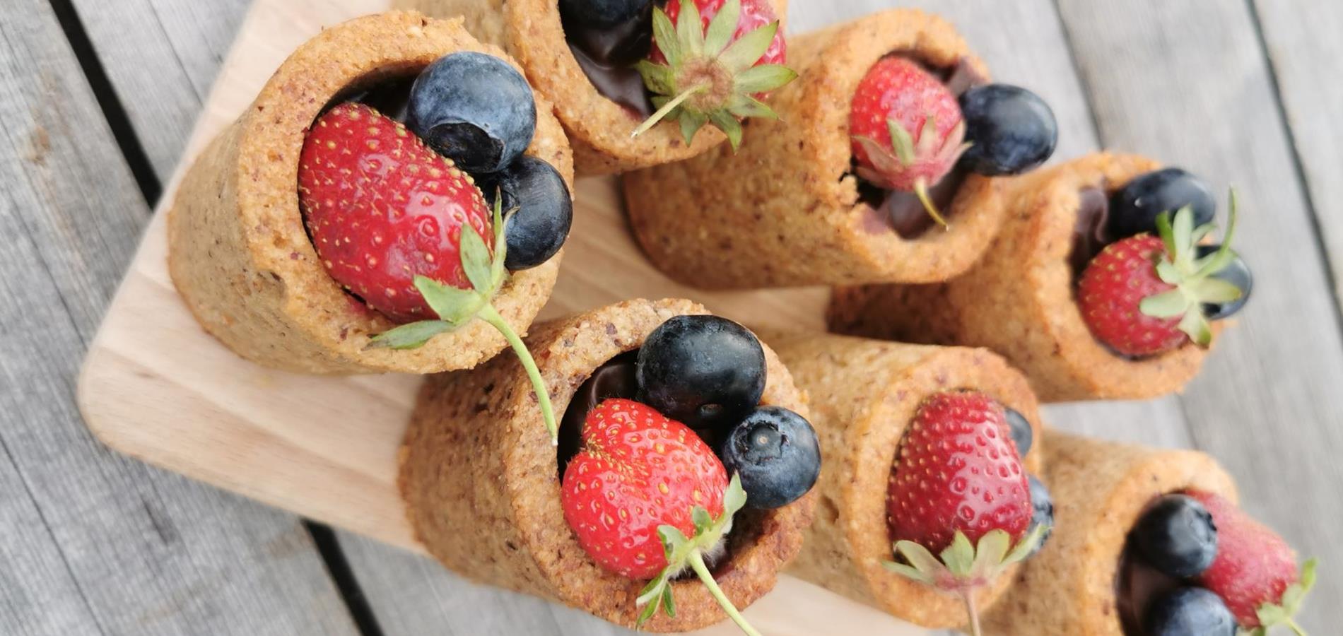 Hazelnut shots with chocolate cream and berries