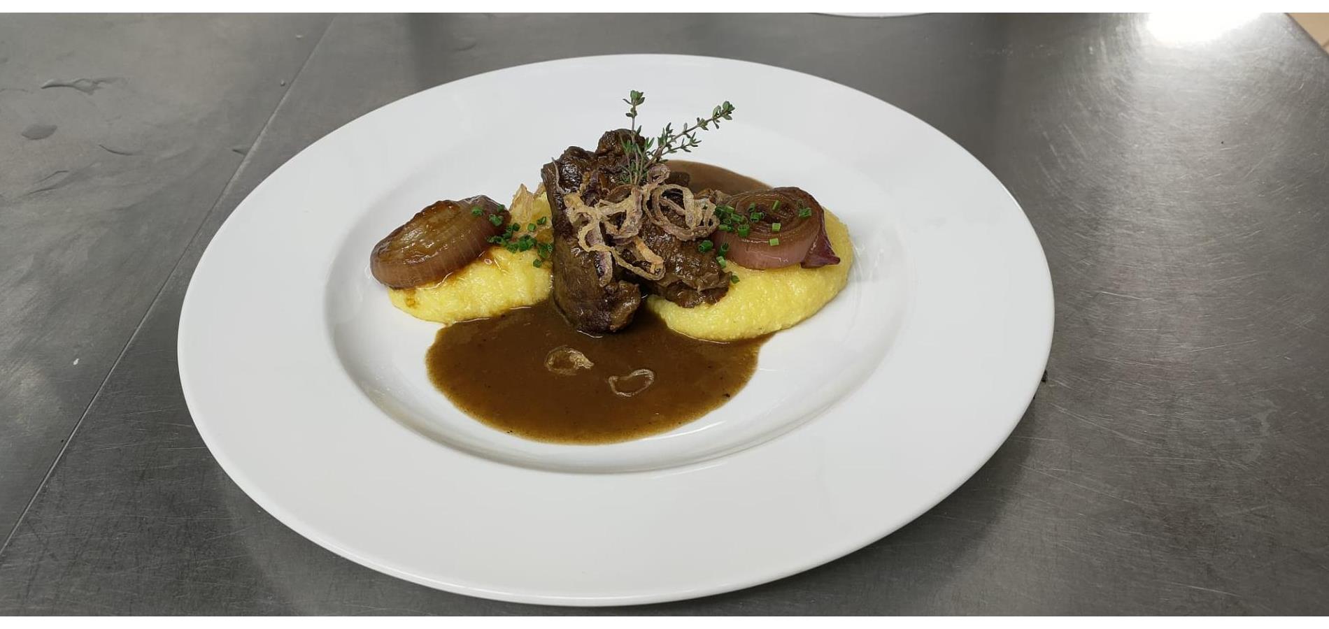 Roast Highland Beef, Braised in South Tyrolean Lagrein, with Creamy Polenta and Tropea Onions
