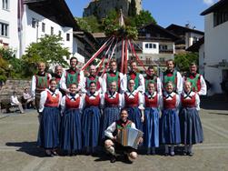Traditional torch dance on the Raiffeisen square Schenna