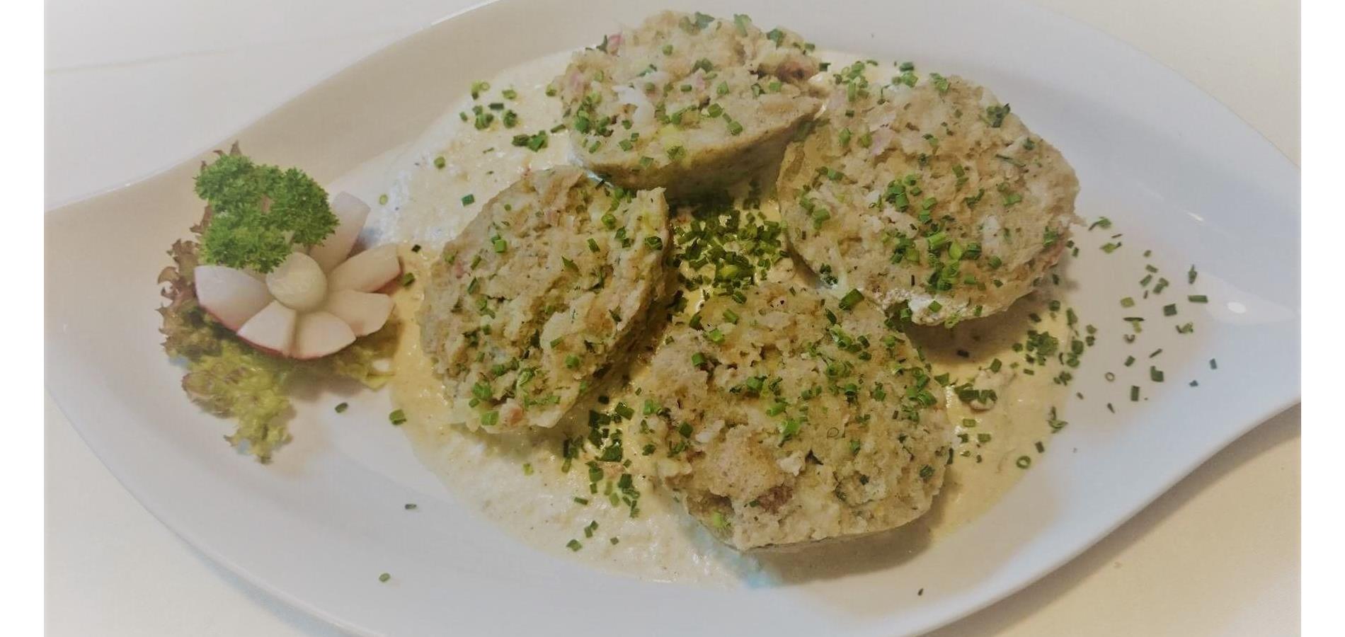 Rye bread and buckwheat dumplings with ricotta, capers and dried tomatoes