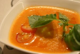 Tomato soup with mozzarella and fresh basil
